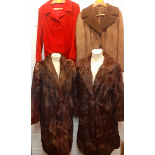 104 - Four vintage coats comprising a National Fur Company brown ermine coat approx 38