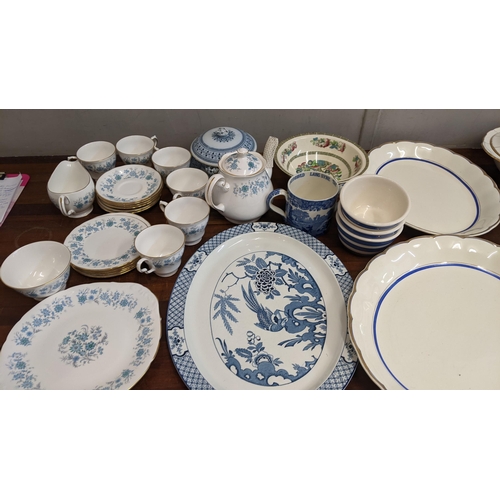 119 - A collection of tea and dinner ware to include a blue and white Grindley cream petal part dinner ser... 