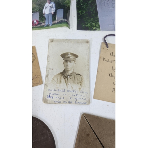 125 - A WWI Death Plaque entitled to Archibald Lane together with his photograph, Field Service postcard a... 