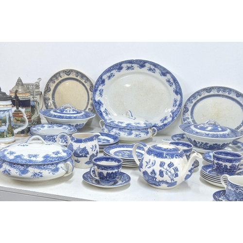 126 - A mixed lot of blue and white ceramics to include an Old Willow tea pot and others together with thr... 