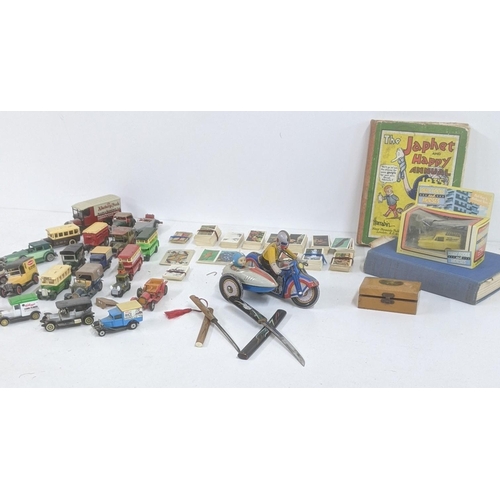 160 - Toys to include a vintage wind-up Tin toy Litho Graphics motorcycle and sidecar, together with Match... 