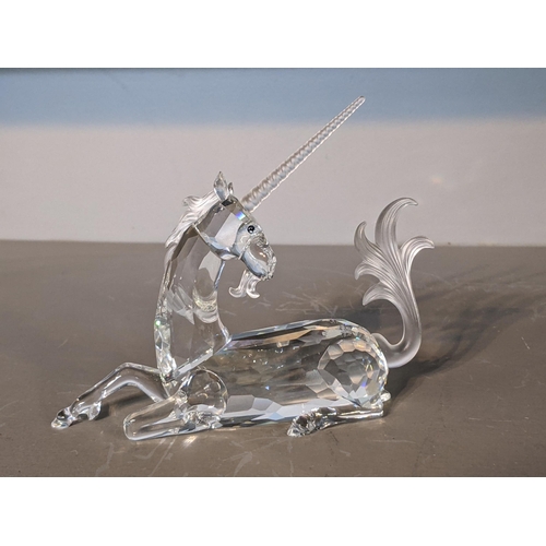 37 - Swarovski Crystal Society Annual editions including; 1995 Lion, 1996 Unicorn, 1997 Dragon and a 1998... 