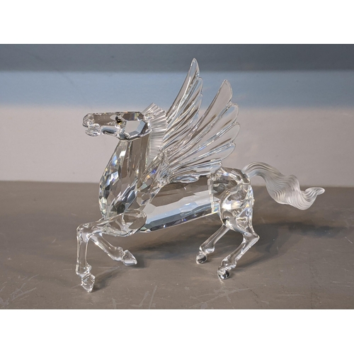 37 - Swarovski Crystal Society Annual editions including; 1995 Lion, 1996 Unicorn, 1997 Dragon and a 1998... 