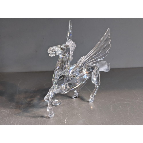 38 - Swarovski Crystal Society Annual editions including; 1995 Lion, 1996 Unicorn, 1997 Dragon and a 1998... 