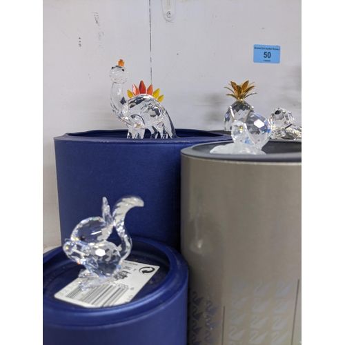 50 - Swarovski Crystal Society models of animals to include a dinosaur, squirrel, a ladybird, a chimp, a ... 