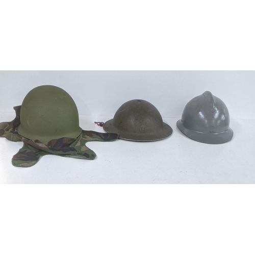 64 - Three helmets to include French, American, British examples
Location: SL
If there is no condition re... 