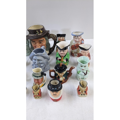 66 - A collection of Toby jugs to include Burlington ware examples, A Shorter & Son Toby and teapot, a Ro... 