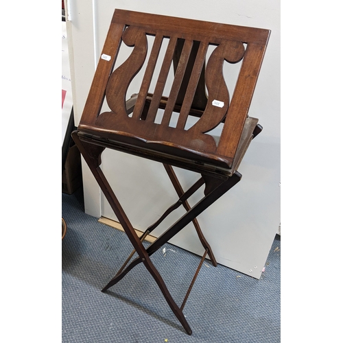 75 - An early 20th century mahogany folding music stand, 70.5cm h x 42.5cm w A/F
Location: SL
If there is... 