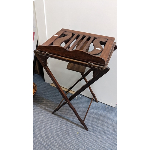 75 - An early 20th century mahogany folding music stand, 70.5cm h x 42.5cm w A/F
Location: SL
If there is... 