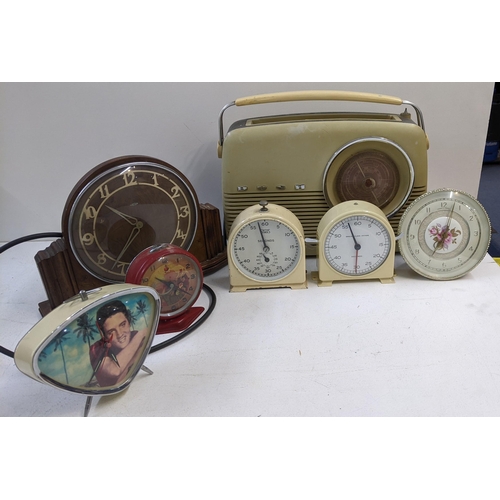 86 - A collection of vintage clocks to include a Smiths timer, a Metamec electric mantle clock without pl... 