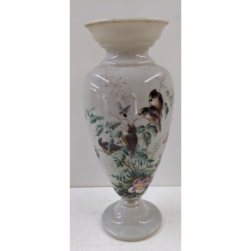 90 - Circa 1900, a vase decorated with birds, foliate and flowers, 35.5cm high
Location: 1-2
If there is ... 