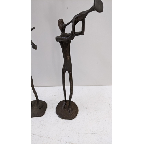 92 - Two bronzed figures depicting a violin and trumpet player
Location: 1-3
If there is no condition rep... 