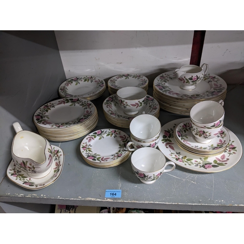 164 - A Wedgwood Hathaway rose pattern part dinner and tea service comprising approx 60 pieces
A quantity ... 