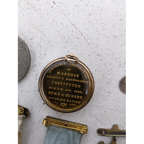 165 - A group of four silver gilt and enamelled Masonic steward badges on ribbons along with a Duke of Sus... 