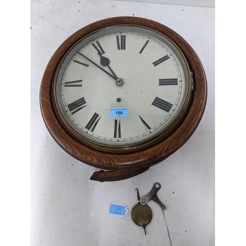 166 - A 19th Winterhalder & Hofmeier dial clock in an oak casing, painted cream 29cms dial with roman nume... 