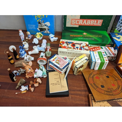 18 - Collectables and board games to include playing cards, cribbage board, Kalookie, Pendelfin figures, ... 