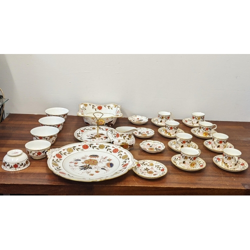 A Royal Crown Derby tea service decorated in the Imari pattern to include cups and saucers, bowls, fruit bowl, large dish and others
Location: 7-1
If there is no condition report shown, please request