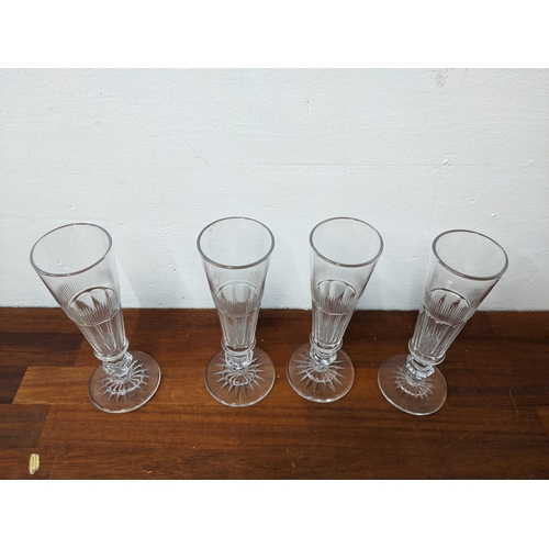 6 - A set of four Baccarat 19th/20th century Champagne flutes (unmarked)
Location: R2.1
If there is no c... 