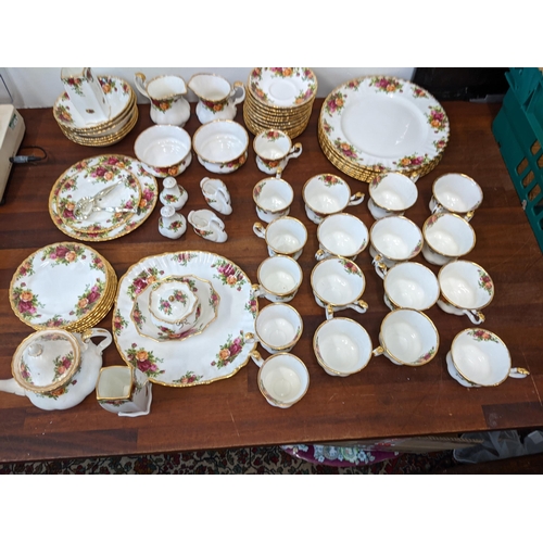 153 - A Royal Albert Old Country Roses tea/coffee/dinner service to include twelve cups, saucers, six dinn... 