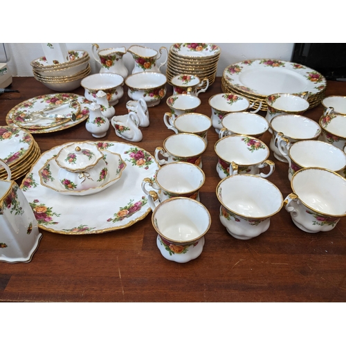 153 - A Royal Albert Old Country Roses tea/coffee/dinner service to include twelve cups, saucers, six dinn... 