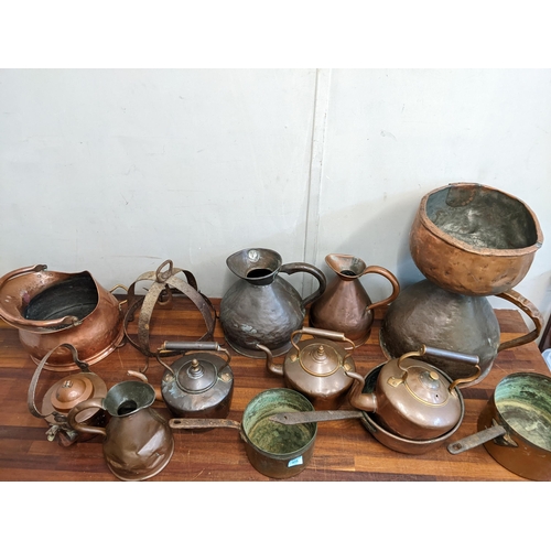 435 - Copper to include three kettles, measuring jugs, saucepans, a funnel and other items
Location:G
If t... 