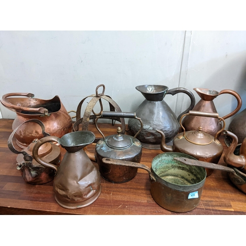 435 - Copper to include three kettles, measuring jugs, saucepans, a funnel and other items
Location:G
If t... 