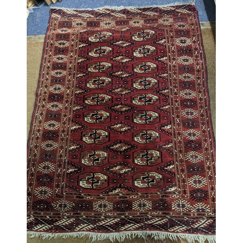 457 - A Bokhara rug with repeated gulls on a red ground Location:A2M
If there is no condition report shown... 