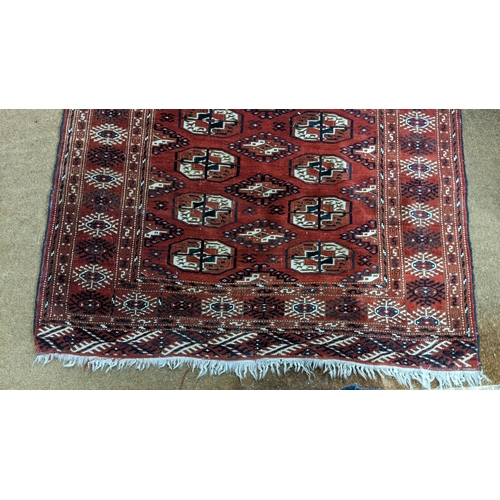 457 - A Bokhara rug with repeated gulls on a red ground Location:A2M
If there is no condition report shown... 