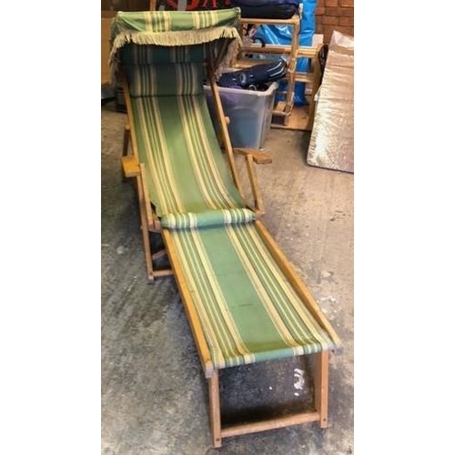 458 - An early 20th century Haxyes folding steamer chair with a canopy top Location:LAM
If there is no con... 