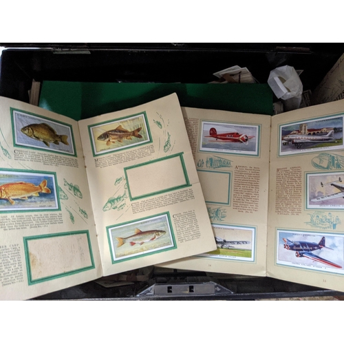 466 - Cigarette albums and cards to include British Freshwater fish, International Airliners and others
Lo... 