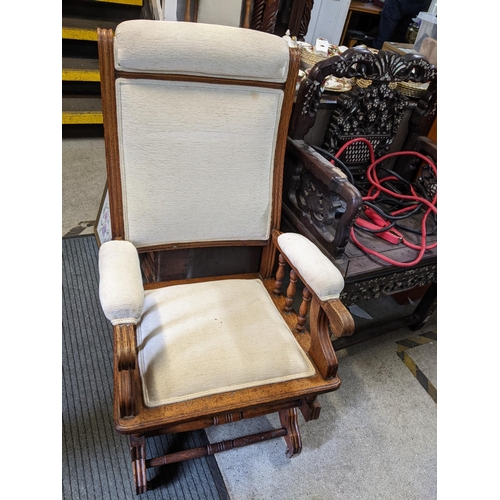 470 - A group of three American rocking chairs with upholstered seats, backs and armrests Location:FOYER
I... 