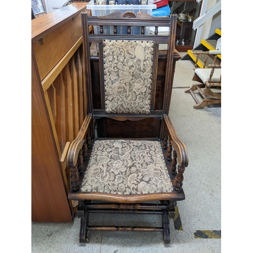 470 - A group of three American rocking chairs with upholstered seats, backs and armrests Location:FOYER
I... 