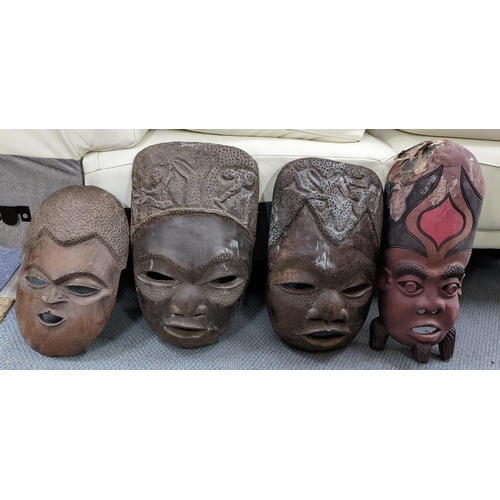 167 - Four African treen tribal carved masks
Location: A1B
If there is no condition report shown, please r... 