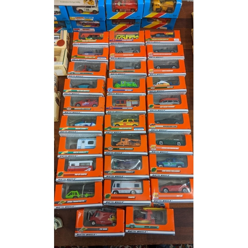 392 - A collection of boxed and unboxed diecast vehicles to include on example commemorating Prince Andrew... 