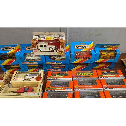 392 - A collection of boxed and unboxed diecast vehicles to include on example commemorating Prince Andrew... 