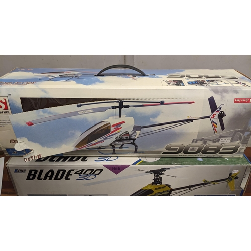 393 - Two radio controlled helicopters to include a Blade 400 3D and a Double Horse 9083, along with a Wii... 