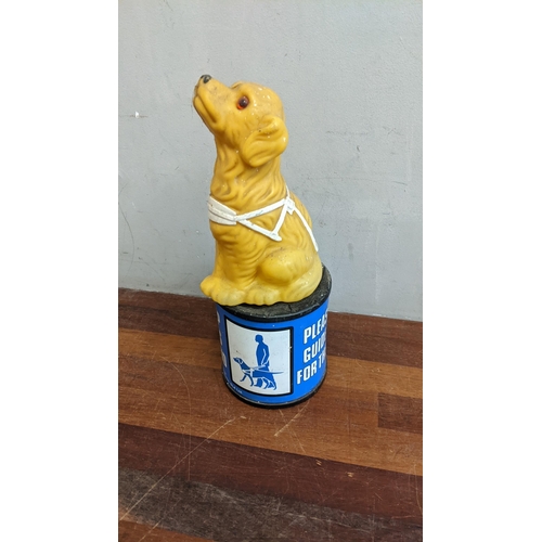 394 - A vintage guide dogs collection box in the form of a dog
Location:4.1
If there is no condition repor... 