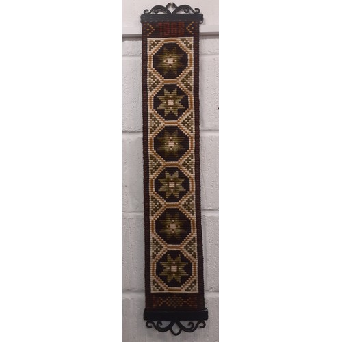 112 - A 1968 Norwegian handmade wool Klokkestreng wall hanging/traditional bell pull having a geometric de... 