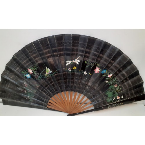 118 - A group of 3 fans to include an early 20th Century French Faucon fan with Oriental design, a mid 20t... 