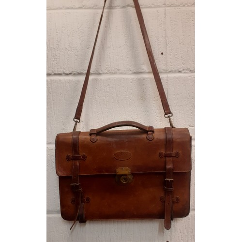 9 - A vintage Mulberry brown leather satchel style briefcase having gold tone lock, serial no:181974 to ... 