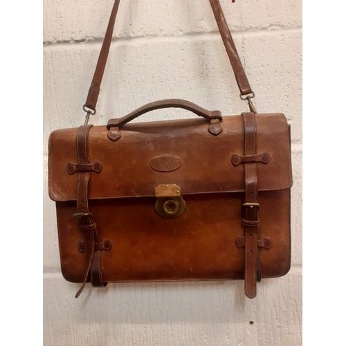 9 - A vintage Mulberry brown leather satchel style briefcase having gold tone lock, serial no:181974 to ... 