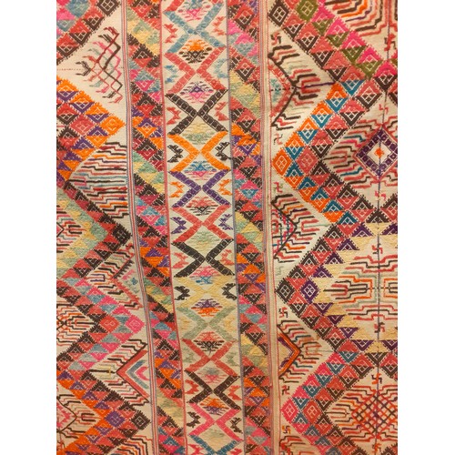 17 - An embroidered Bhutanese wedding blanket with geometric design approx 56