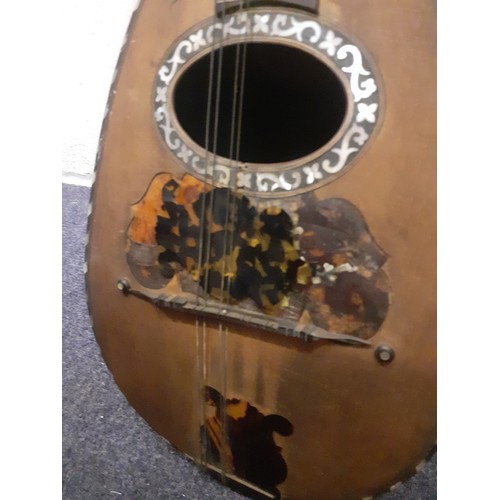 124 - A Phebe mandolin together with a German Kay & Co squeeze box housed in a mahogany box. Location: 1-2... 