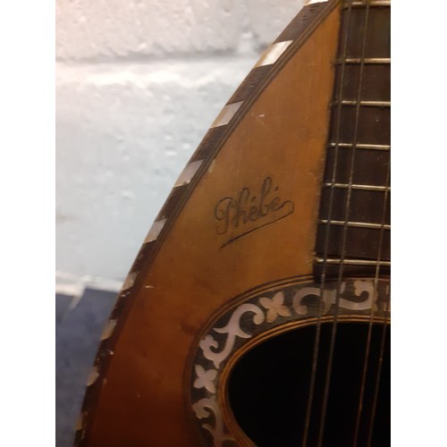 124 - A Phebe mandolin together with a German Kay & Co squeeze box housed in a mahogany box. Location: 1-2... 