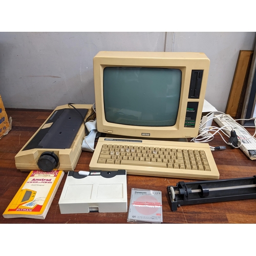 481 - An Amstrad PCW 8256 personal computer with keyboard, monitor printer and accessories in original box... 