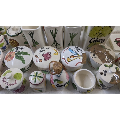 400 - A collection of mostly Toni Raymond pottery to include sauce boats, pots, trays, a Royal Doulton flo... 