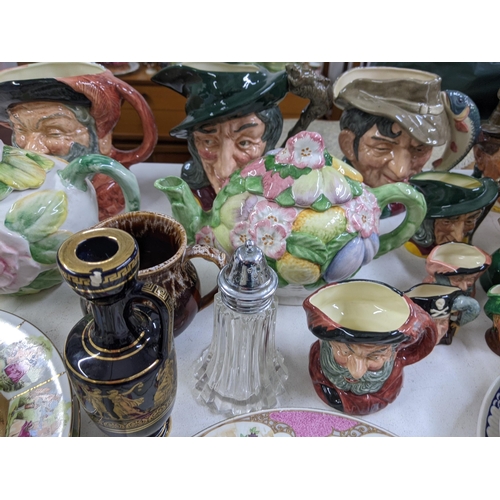 406 - A mixed lot of china and ceramics to include Toby character jugs, 19th century plates and other deco... 