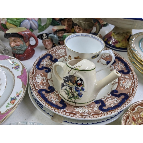 406 - A mixed lot of china and ceramics to include Toby character jugs, 19th century plates and other deco... 