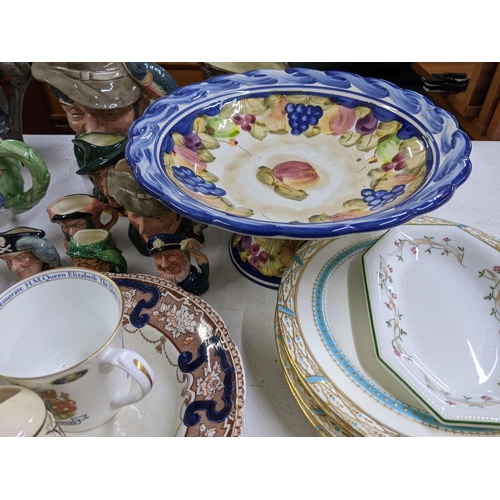 406 - A mixed lot of china and ceramics to include Toby character jugs, 19th century plates and other deco... 