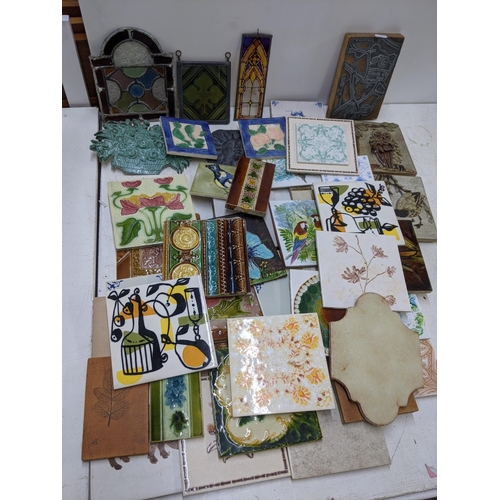 409 - Ceramic tiles to include 19th century examples also including some small stained glass window panels... 